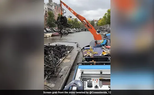 Watch: Dozens Of Discarded Bikes Pulled Out Of Canal During Cleaning Watch: Dozens Of Discarded Bikes Pulled Out Of Canal During Cleaning